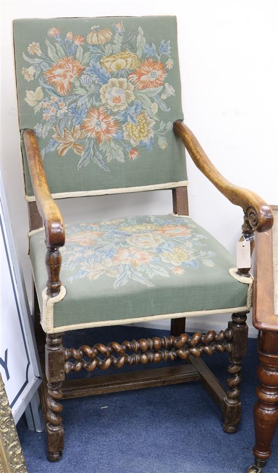 A pair of scroll arm elbow chairs with barley twist legs and supports